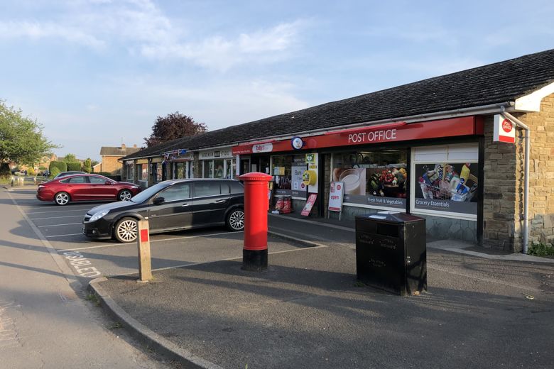 Parish council criticises city council for delay in providing local shop signs