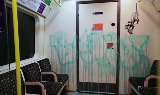 Coronavirus: Cleaners who removed Banksy's face mask Tube graffiti 'did not know who painted it'